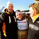 King Harald and Queen Sonja with gold medalist Therese Johaug after the 30 km cross country (Photo: Lise Åserud / Scanpix)